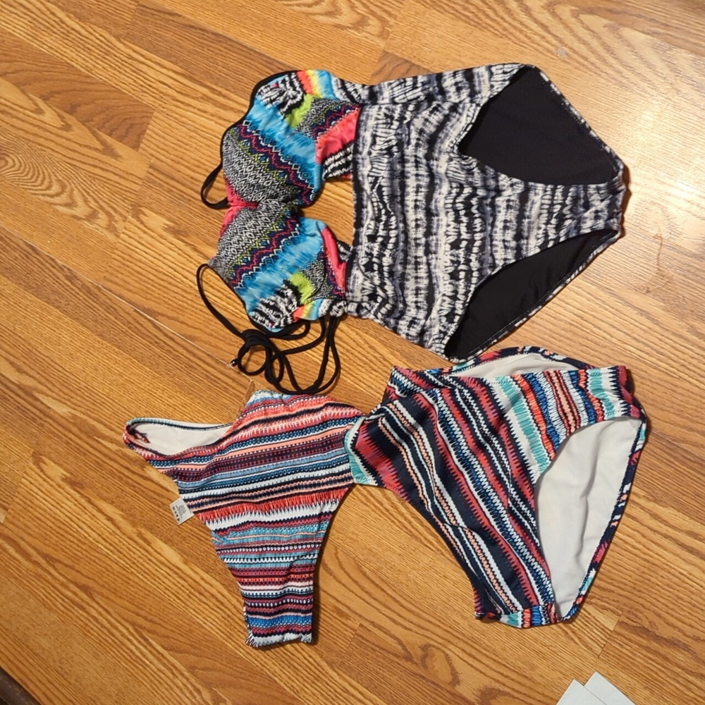 Two women's swimsuits size medium